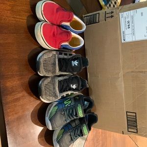 Bundle of name brand boy shoes.